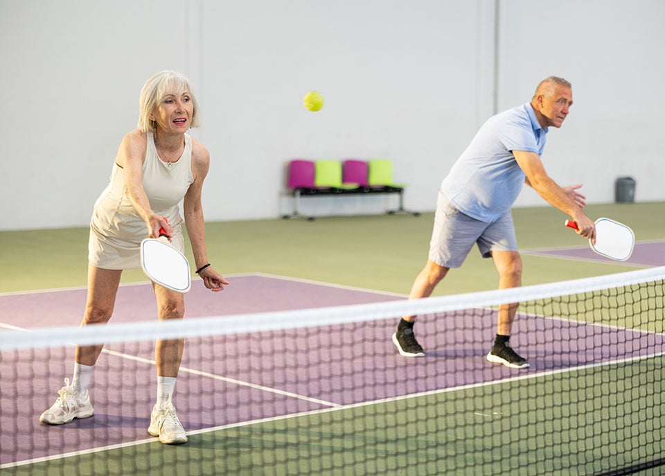 active-seniors-playing-pickleball